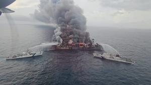 Firefighting efforts intensify aboard Singapore v...