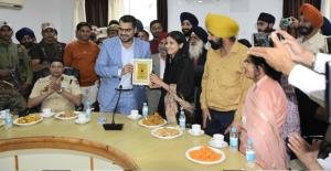 DC Poonch felicitates Parsanjeet Kour on Securing...