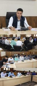 DC Budgam reviews progress under HADP