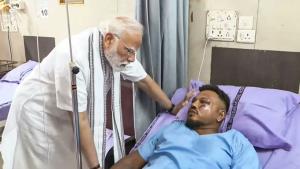 Prime Minister Narendra Modi meets plane crash su...