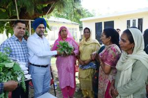 Women farmers imparted training in commercial flo...
