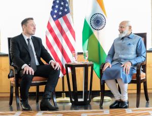 Elon Musk congratulates PM Modi, says looks forwa...