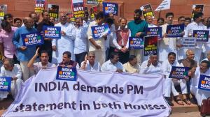 Manipur: Opposition holds protest in Parliament p...